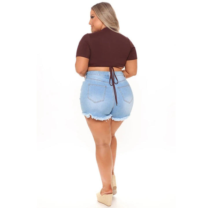 Dame Jeans-Shorts i kreativ patchwork-design med frynset kanter Stilla