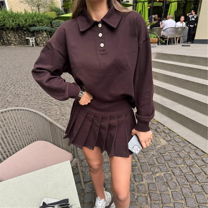 Dame fritidssportskombination med polo-top og plisseret nederdel Stilla