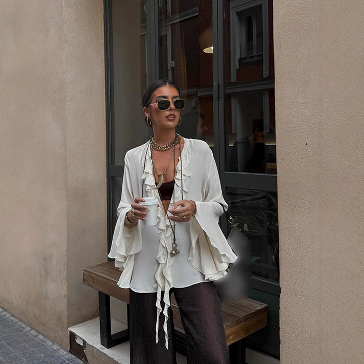 Dame Bluse med flæser og bred pasform samt elegante detaljer Stilla