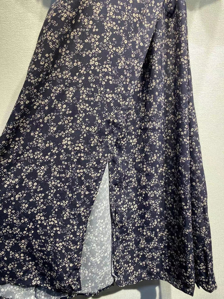 Dame Maxikjole med floralt design og elegante pufærmer Stilla