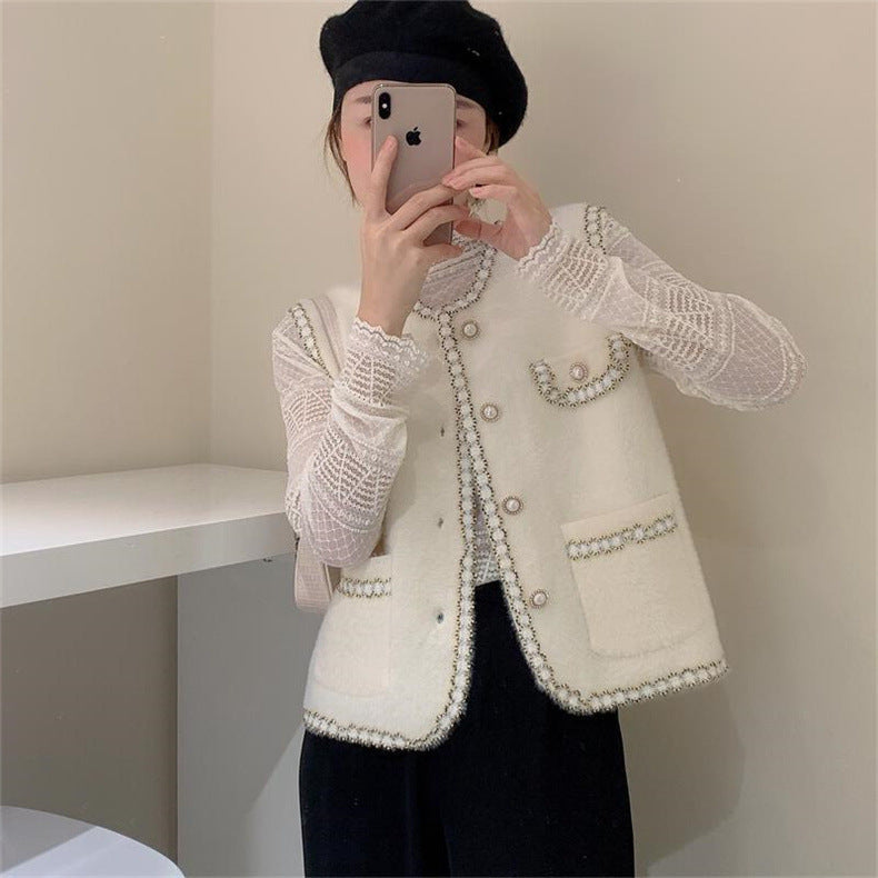 Damevest med elegant perle dekoration Stilla