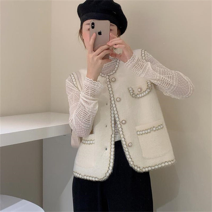 Damevest med elegant perle dekoration Stilla