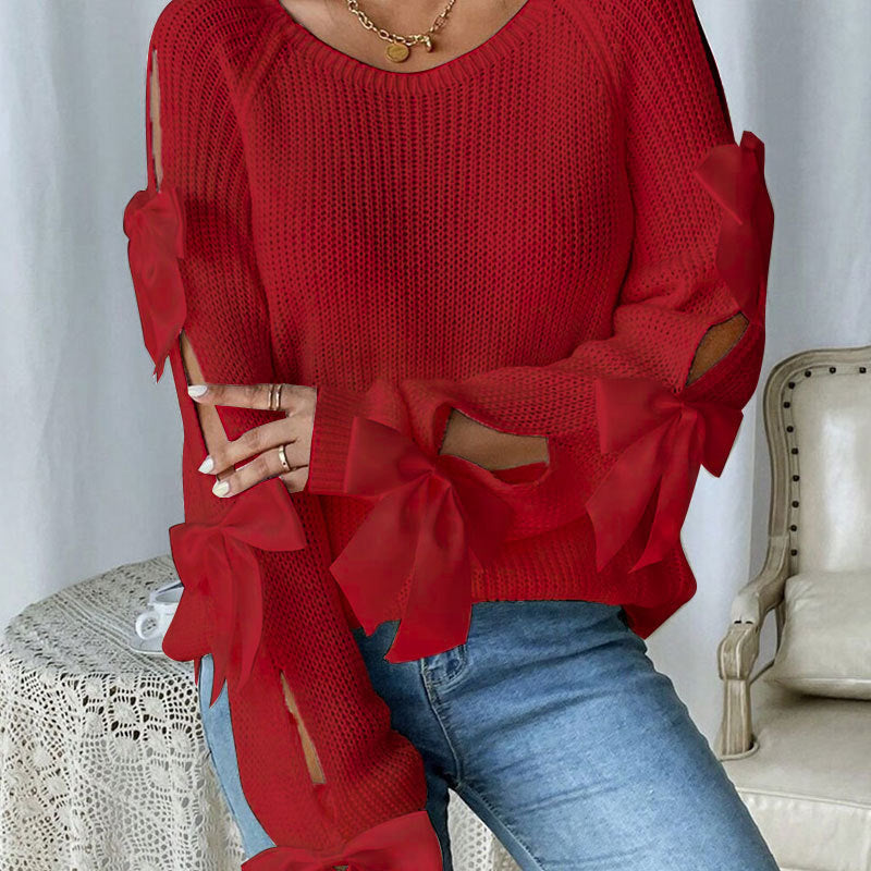 Kvinders strikket sweater med dekorative bue detaljer og åbent ærme design Stilla