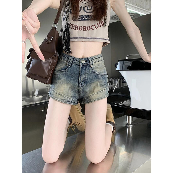 Kvinders højtaljede denim shorts med frynser