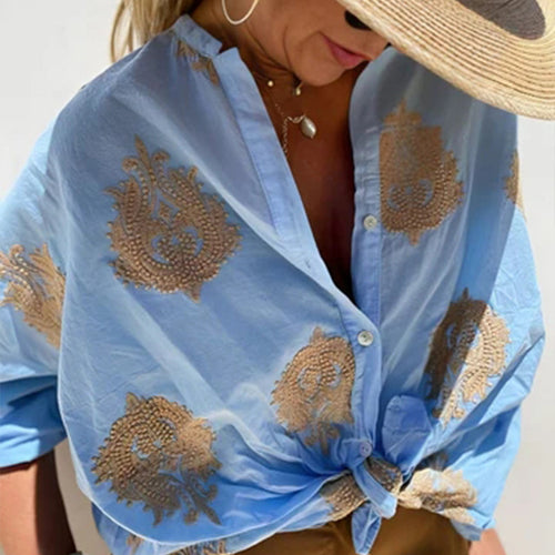 Damebluse med blomsterbroderi og ballonærmer Stilla