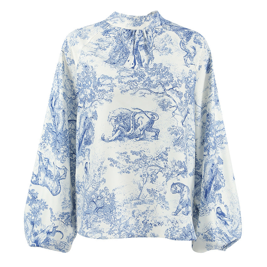 Damebluse med voluminøse ærmer og blomsterdesign Stilla