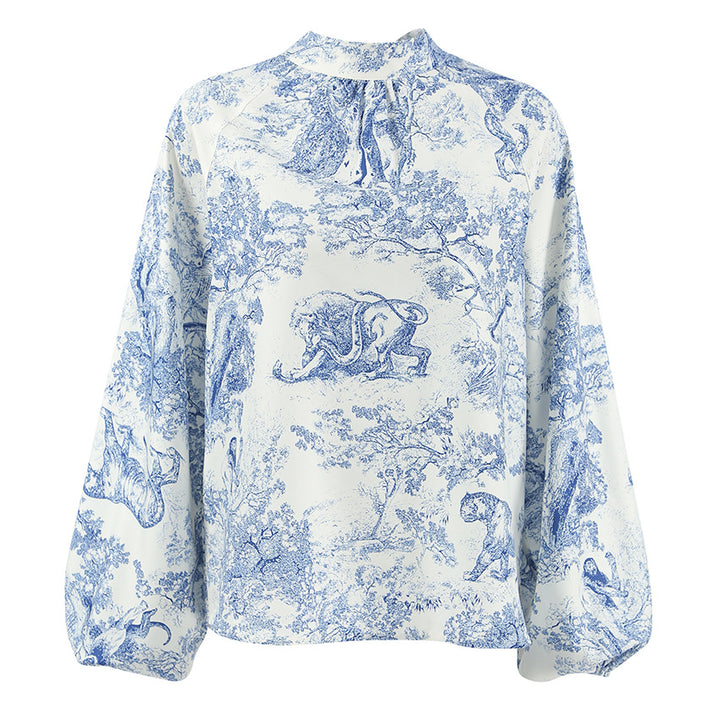 Damebluse med voluminøse ærmer og blomsterdesign Stilla