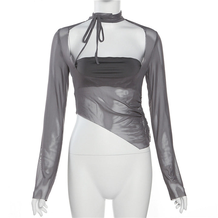 Dame langærmet top med asymmetrisk snit og transparente detaljer Stilla
