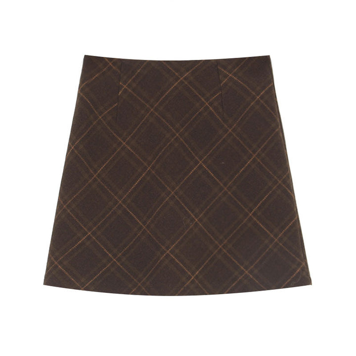 Dame rutet mini skirt i blød uldblanding med elegante lommer og plisseringer Stilla