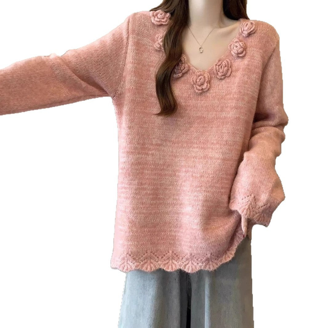 Kvinders store strikket sweater med blomsterapplikationer Stilla