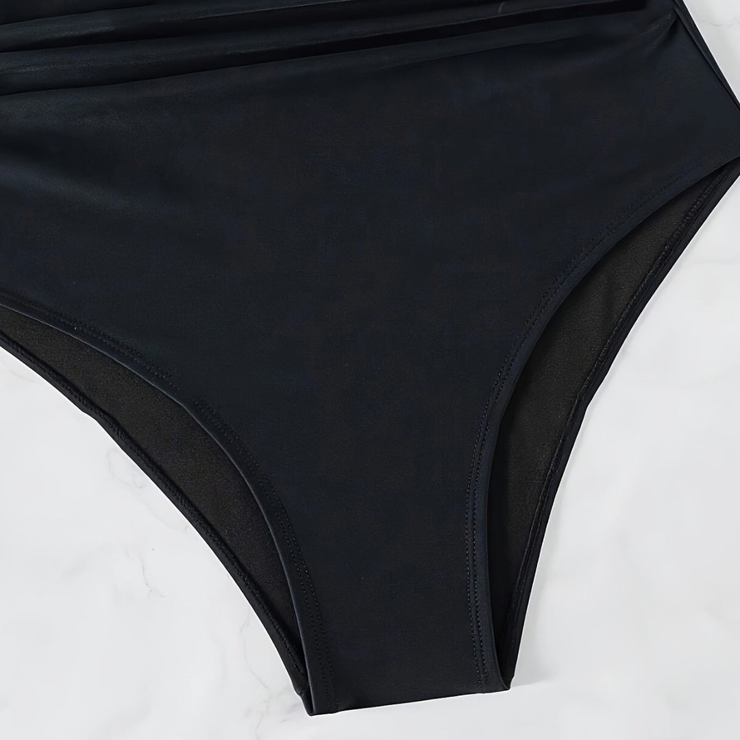 Dame heldragt badetøj med blomstret design og sporty pasform Stilla