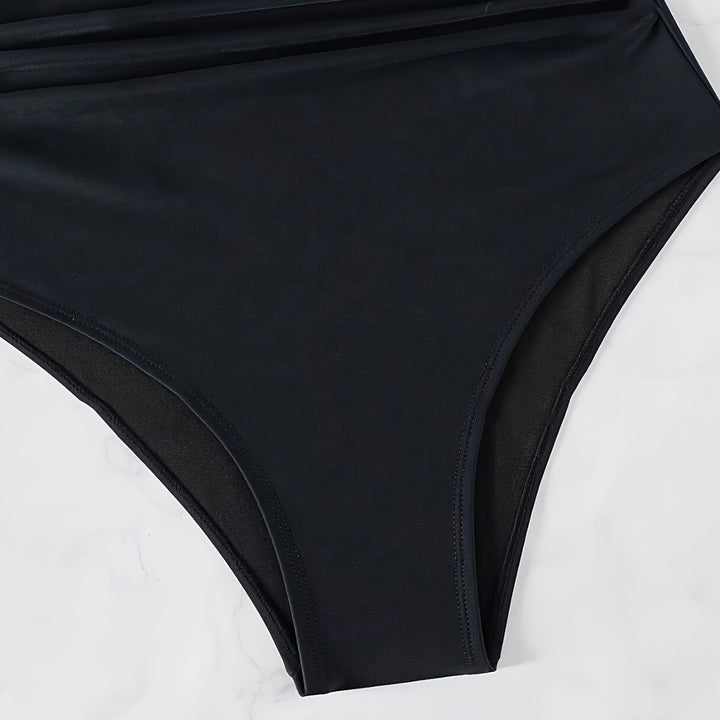 Dame heldragt badetøj med blomstret design og sporty pasform Stilla