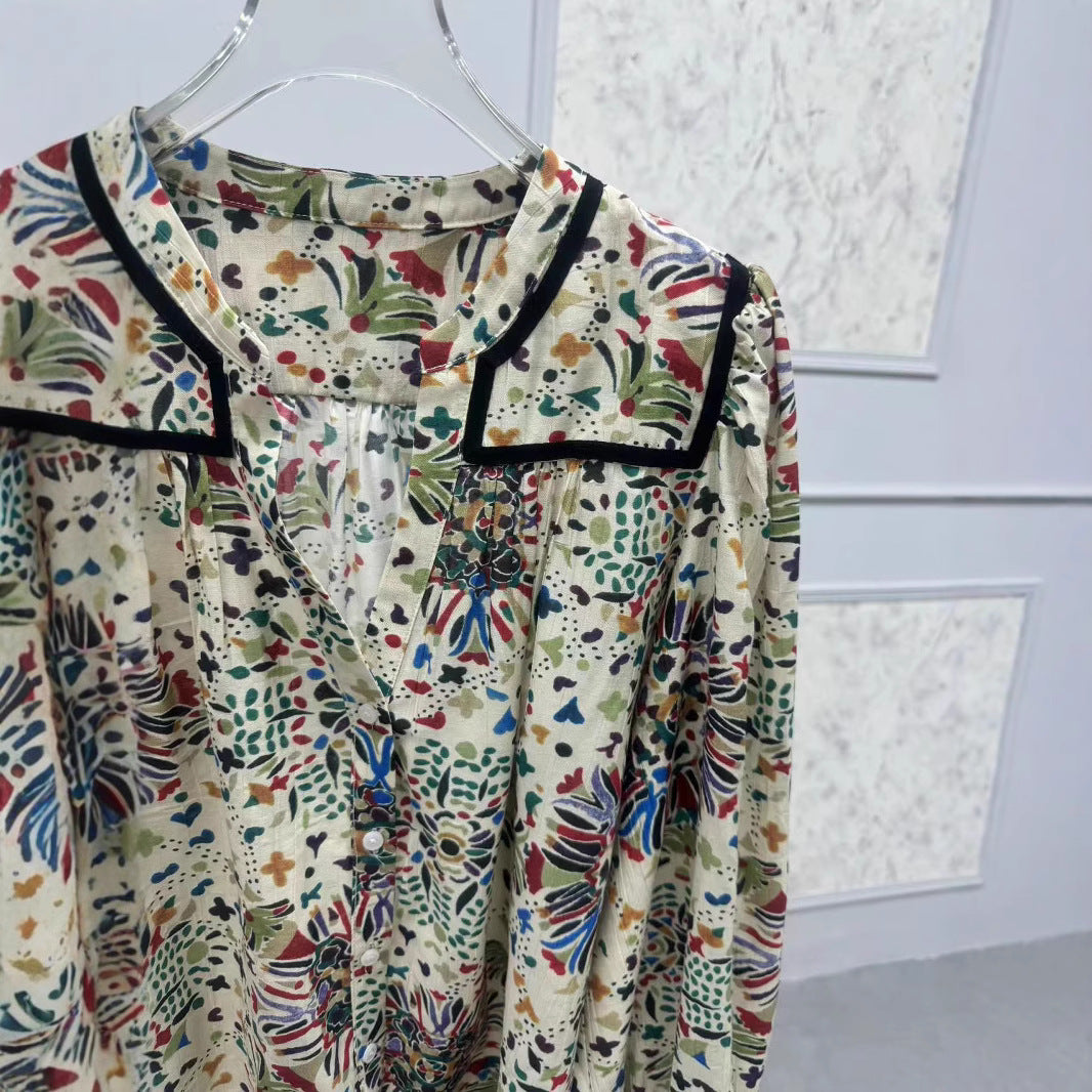 Damebluse med detaljeret blomsterdesign og elegante accenter Stilla