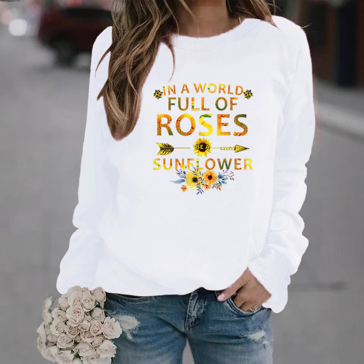Dame sweatshirt med inspirerende design og blomsterdekoration Stilla