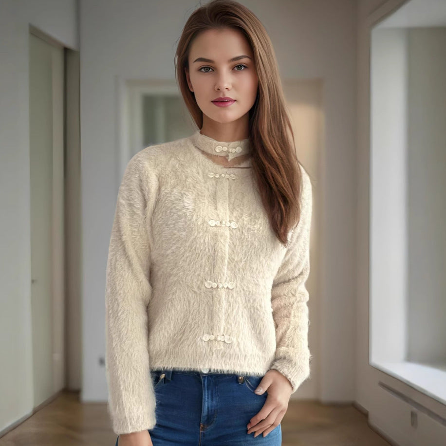 Kvinders krammevenlige sweater med høj krave og dekorative knapdetaljer Stilla