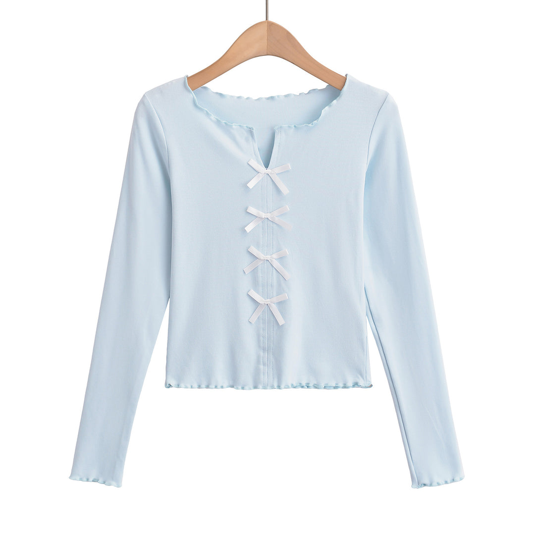 Dame elegant top med floral skæring og fine sløjfedetaljer Stilla
