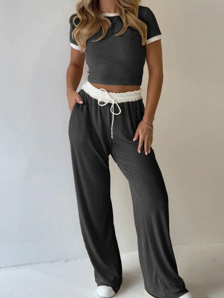 Dame afslappet to-delt fritidssæt med cropped T-shirt og vidde bukser Skovae