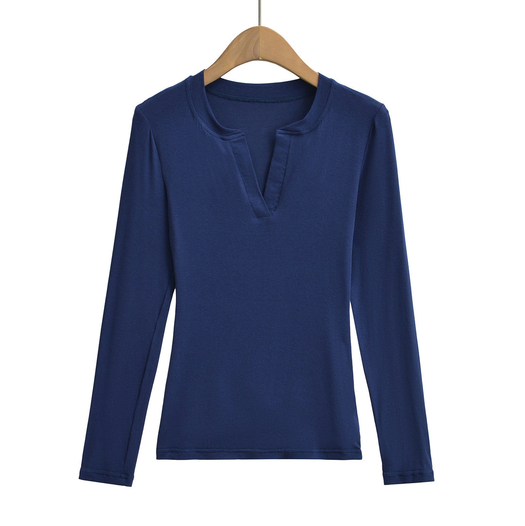 Damer longsleeve top med moderne V-halsudskæring og fin struktur Stilla