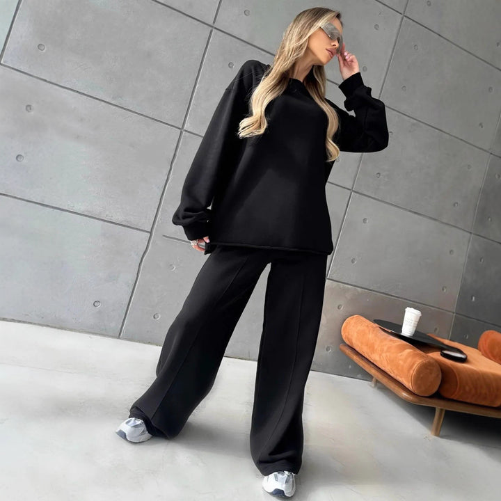 Damer elegant sweatsuit med løs pasform og stilfuld mærkedetalje Skovae