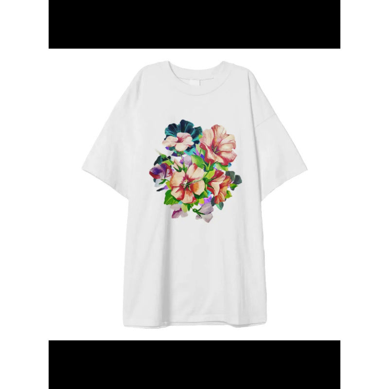 Dame T-shirt med livligt floraldesign og oversized snit Stilla