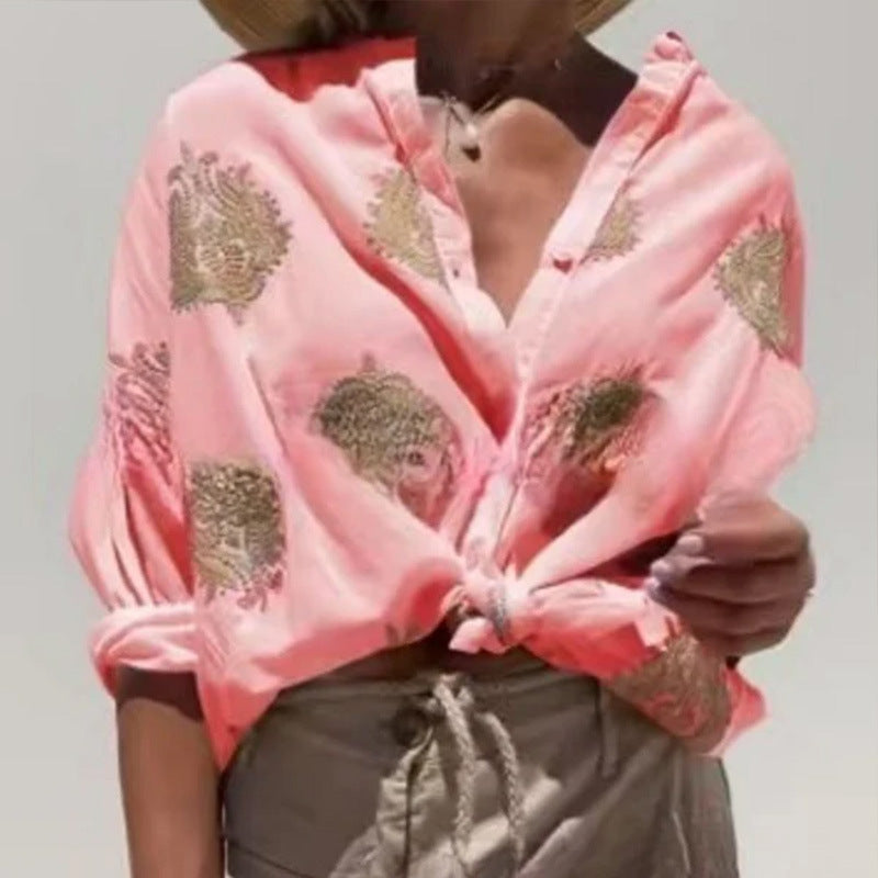 Damebluse med blomsterbroderi og ballonærmer Stilla
