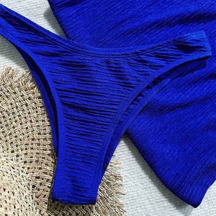 Dame bandeau-bikini med ornamental stjerne-detail og moderne indpakningsnederdel Skovae