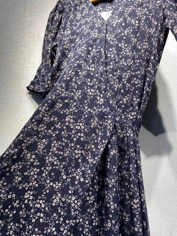 Dame Maxikjole med floralt design og elegante pufærmer Stilla