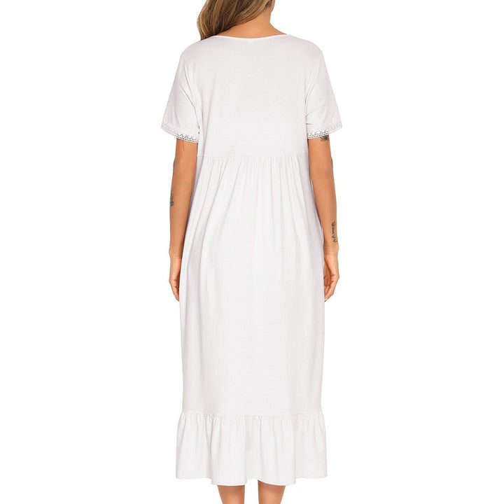 Dame natkjole med fine spids aksenter og lommer Stilla
