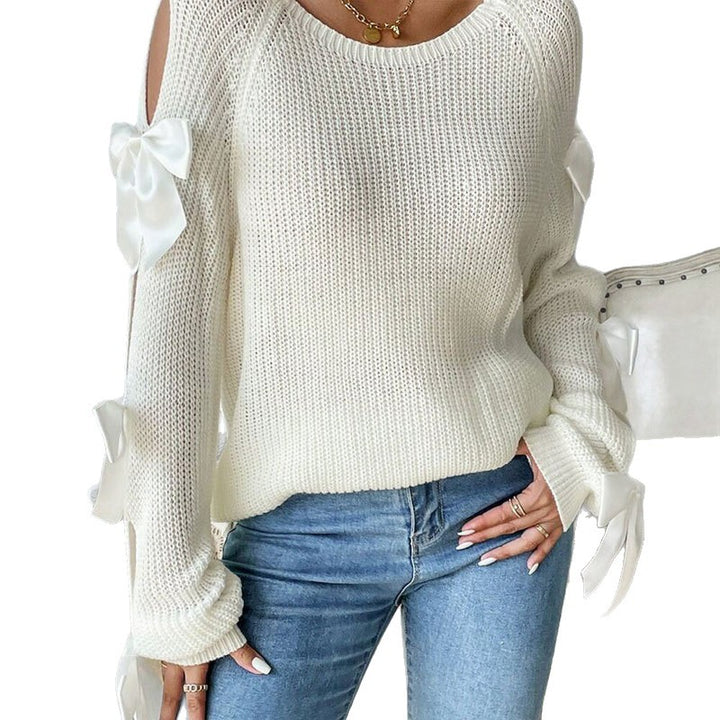Kvinders strikket sweater med dekorative bue detaljer og åbent ærme design Stilla