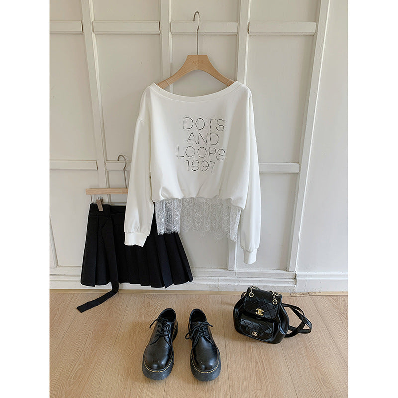 Dame afslappet sweatshirt med trendy asymmetrisk design og dekorative rhinestone-detaljer Stilla