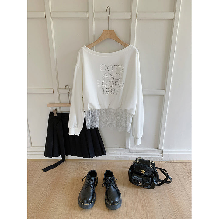 Dame afslappet sweatshirt med trendy asymmetrisk design og dekorative rhinestone-detaljer Stilla