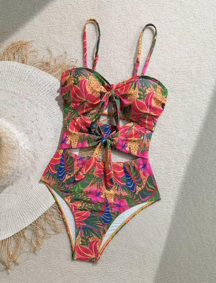 Dame one-piece badedragt med dekorativ knude detalje og legende blomstermønster Skovae