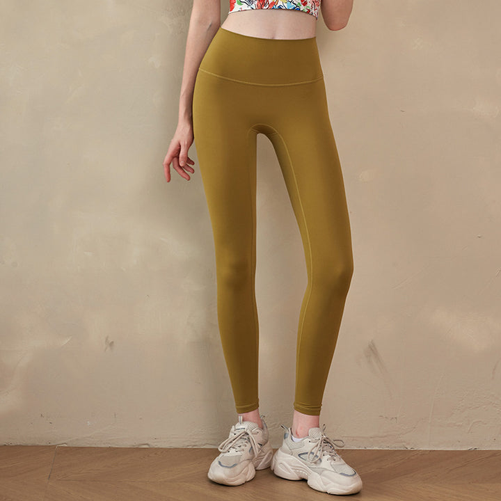Dame højtaljede yogaleggings i åndbart materiale med figursyet snit Stilla