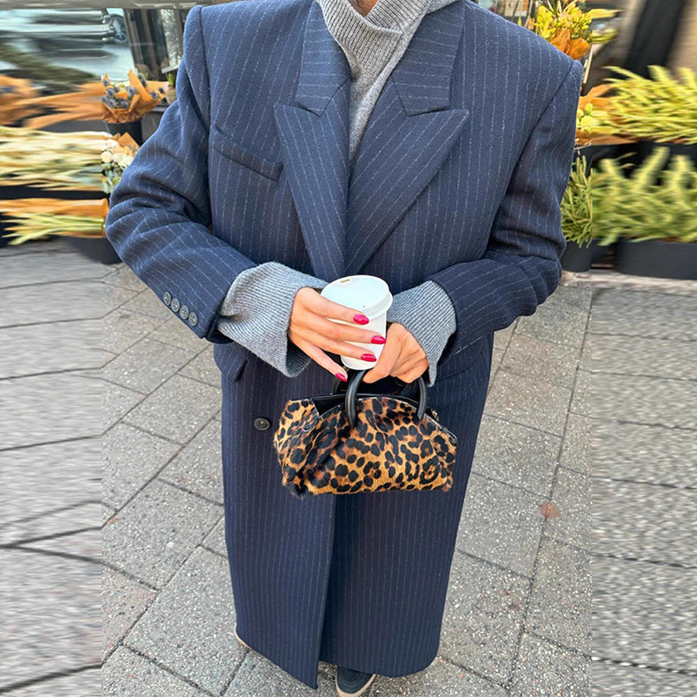 Kvindernes elegante striped trenchcoat med dobbelte knaplukninger og praktiske lommer Stilla