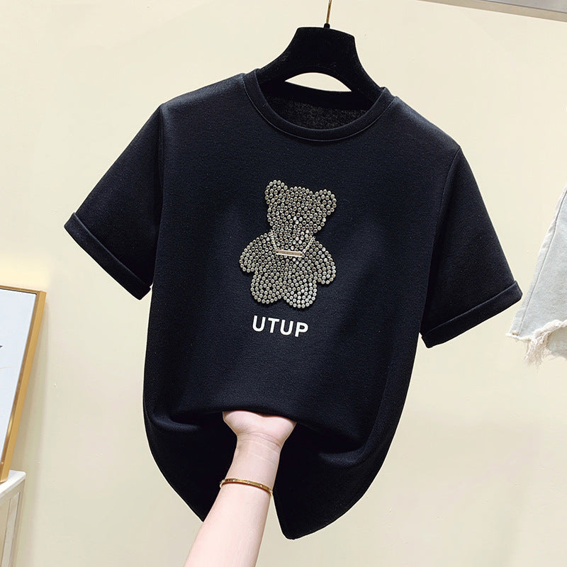 Kvinders T-shirt med funklende bjørnemotiv og afslappet pasform Stilla
