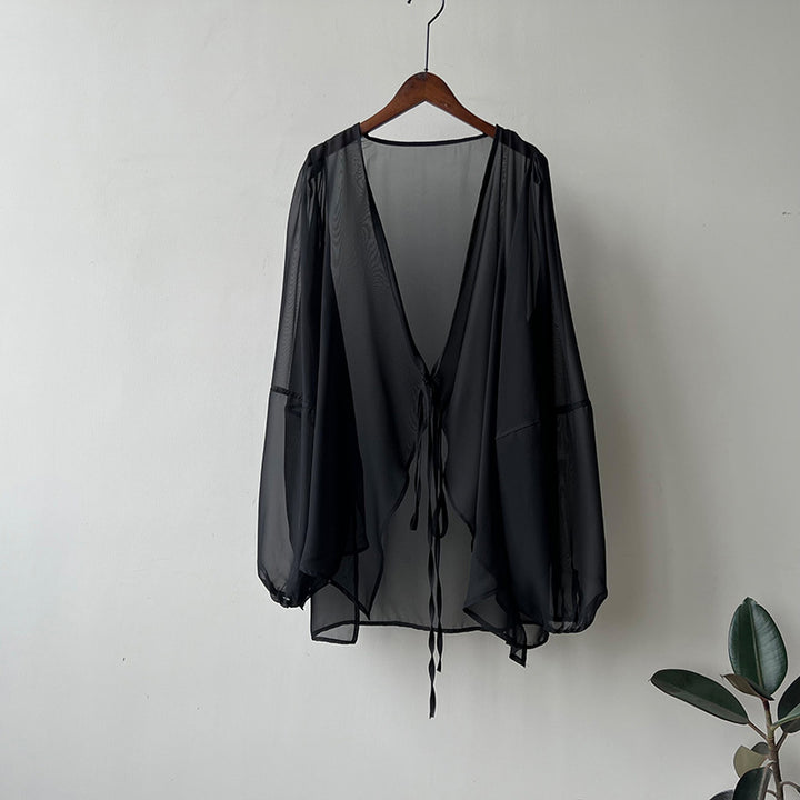 Dame elegant gennemsigtig bluse med dyb V-hals og bindebånd Stilla