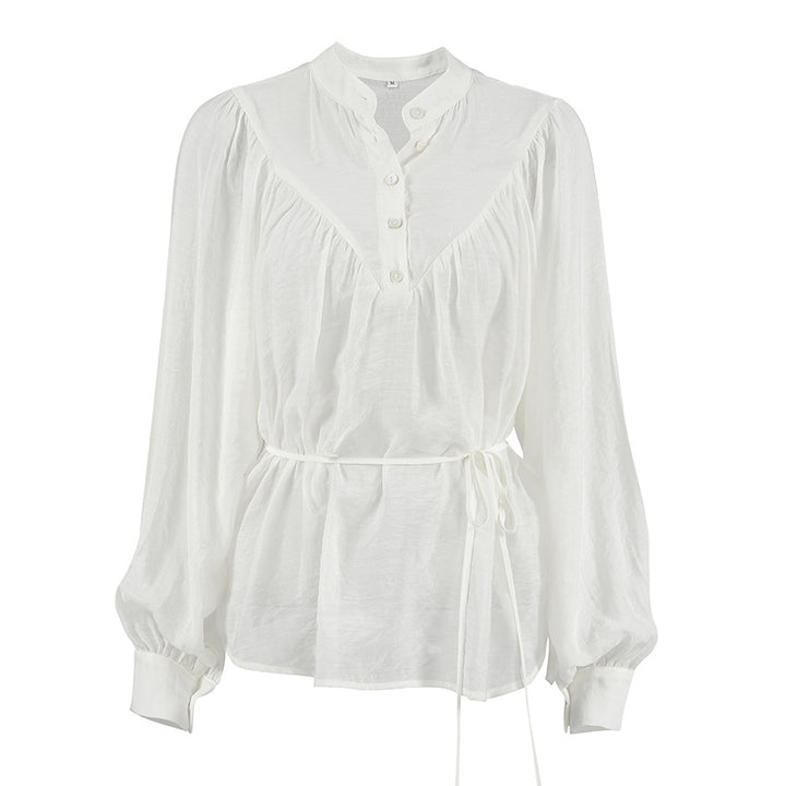 Damebluse med taljeret silhuet og elegant snøring Stilla