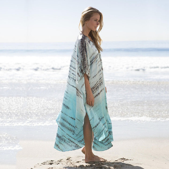 Dame luftig Strandkaftan med elegant bølgemønster og sidelukning Stilla