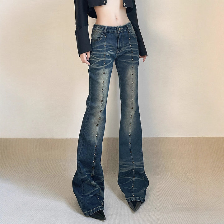 Dame flared jeans med dekorative knapdetaljer og fremragende denim-finish Skovae