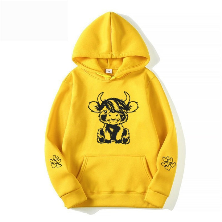 Kvindernes hætte sweatshirt med charmerende kvægmotiv og praktiske kængurulommer Skovae