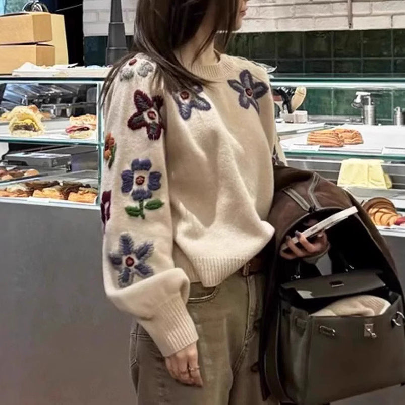 Kvinders elegante strikket sweater med blomsterbroderi design og afslappet snit Stilla