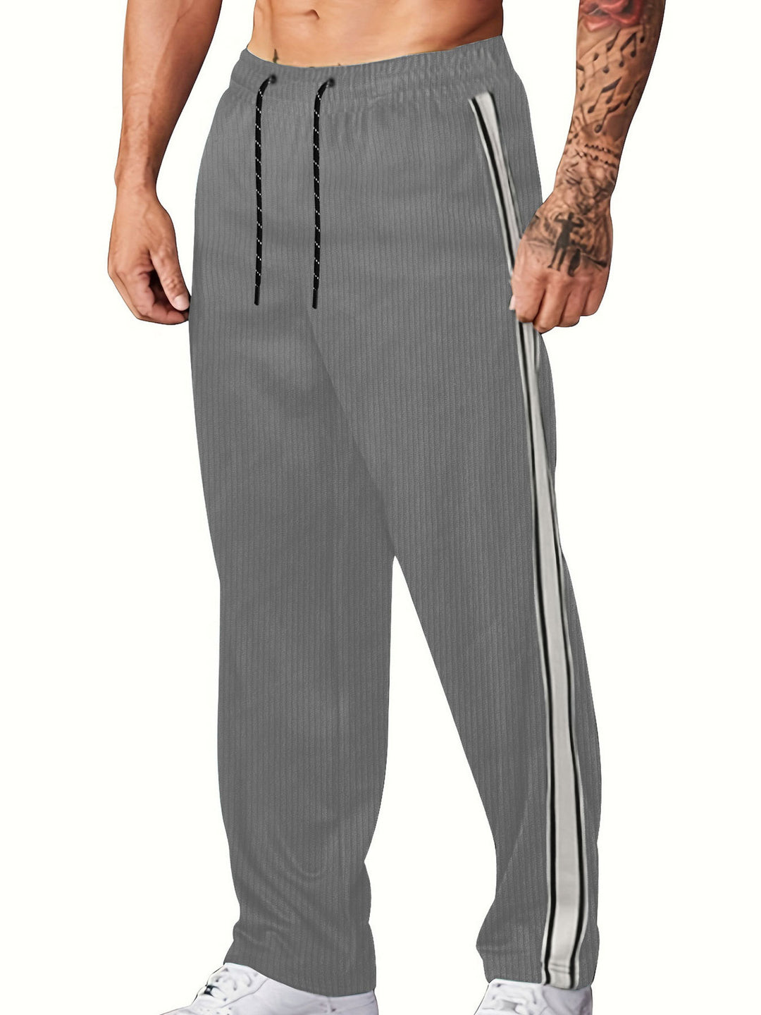 Herren nan ribbet Relax-Joggingbukser med bred ben, siden piping og elastisk snørebånd Skovae