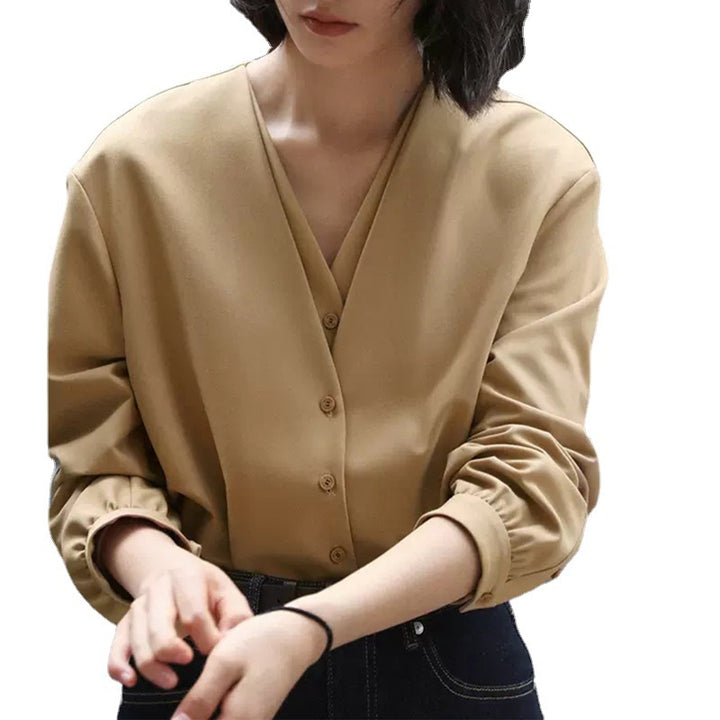 Dame elegant bluse med V-udskæring og knapdetaljer Stilla
