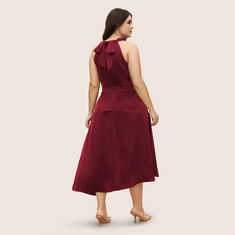 Dame elegant maxikjole med asymmetrisk neckholder og sidelommer Stilla