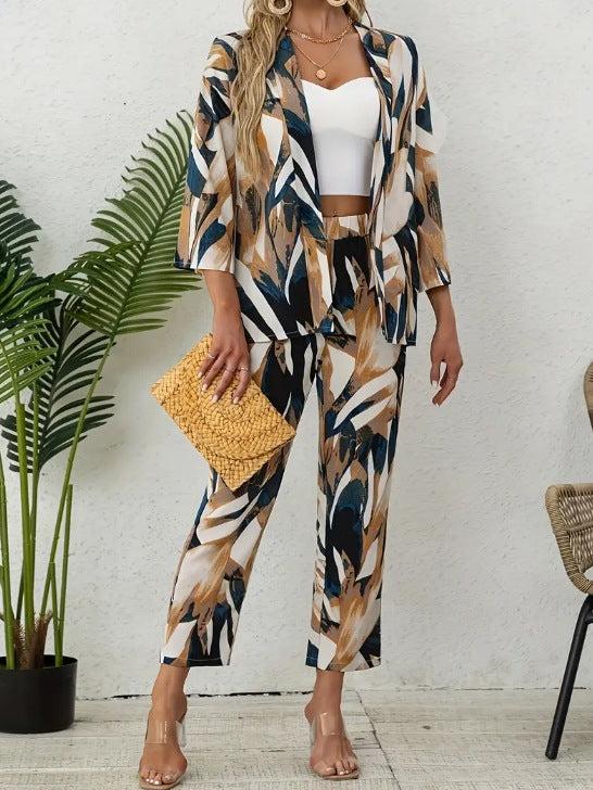 Dame To-delt Floral-outfit med løstsiddende blazerjakke og elegant bukser Stilla