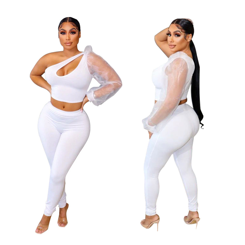 Dame trendy sæt bestående af crop top med asymmetrisk udskæring og figurnær leggings Stilla