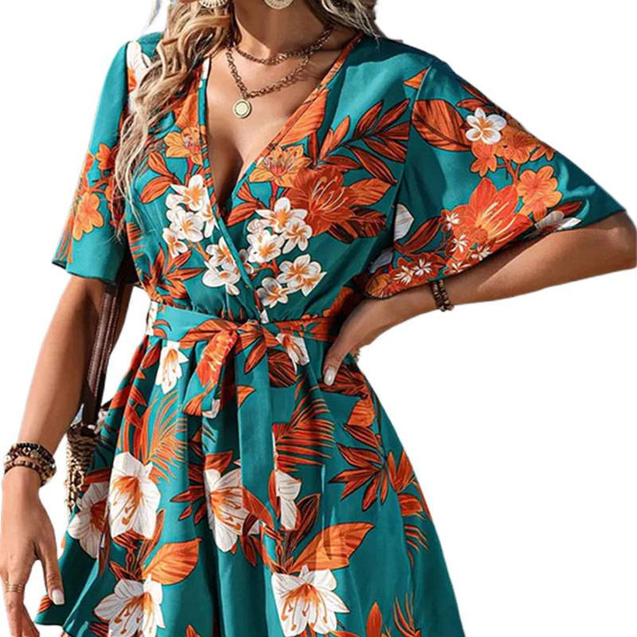 Dame jumpsuit med floralt design og vide ærmer Skovae