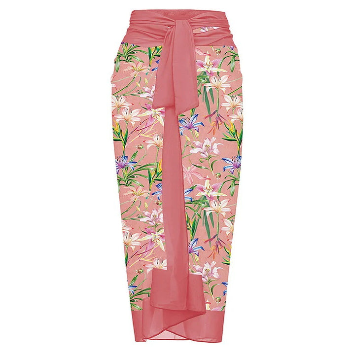 Dame badedragt med voluminøse flæsedetaljer og matchende sarong Stilla