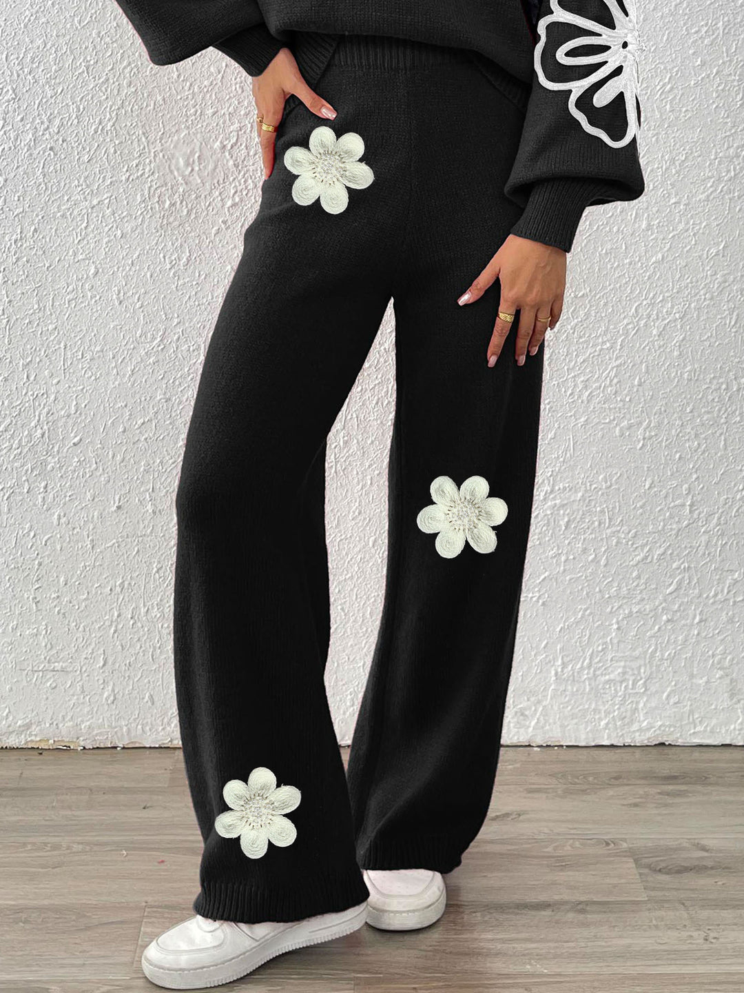 Dame strikbukser med blomstret design og bredt ben Stilla