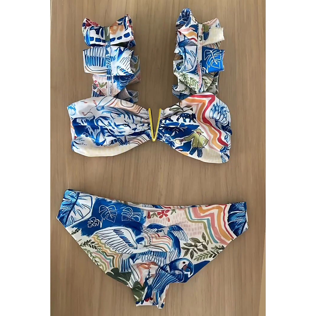 Dame bikini-sæt med voluminøse flæsedetaljer og elegant blomster-design Stilla